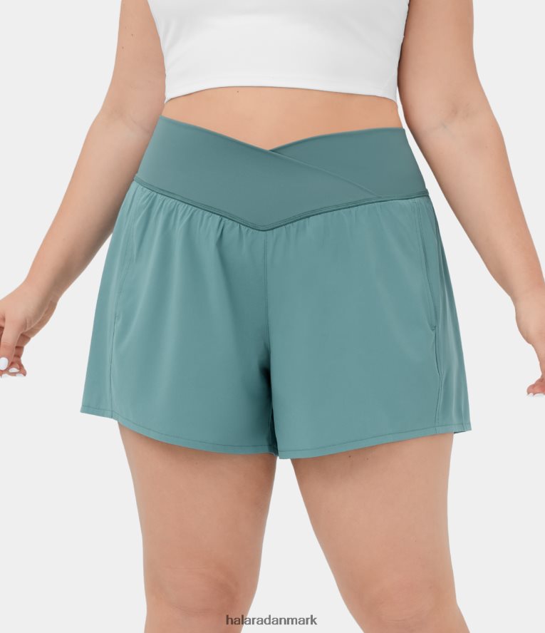 bunde dk Halara Kvinder Breezeful højtaljet crossover sidelomme plus størrelse 2-i-1 hurtigtørrende yogashorts 4,5" mineralblå TH606J1287